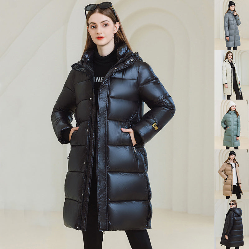 Manteau d'hiver chaud à capuche avec poches, veste longue en coton simple et tendance, couleur unie, vêtements d'extérieur pour femmes